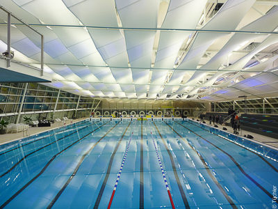 Membranes as ceiling sails for acoustics and lighting, aquatic centre Graz Eggenberg