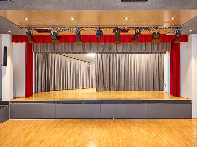 Stage curtains and stage curtain rails, Schönberg Community Centre in the Stubai Valley